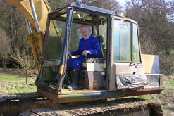 Richard Stilgoe and his digger