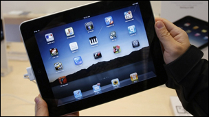 Woman holding iPad