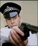 Police man holding gun