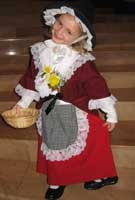 Ela Mai yn ei gwisg Gwyl Dewi