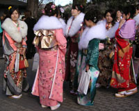 Japanese girls in furisode kimonos and traditional shoes at a Seijin Shiki celebration
