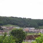 July 2005: Whitehaven, Cumbria. A view across the Valley towards ‘The Brows’, Arrowthwaite, Kells, Whitehaven, Cumbria. On 14 October 1943 an Avro Anson training aircraft crashed on this hillside killing all five crewmen. (The woodland was planted after World War Two)