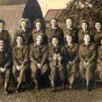 Search-light squad with Monica McKevitt seated with the Spaniel