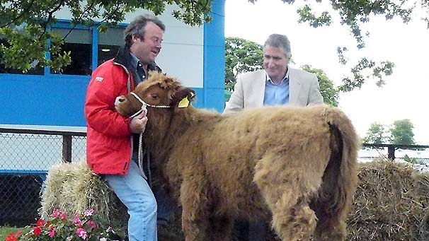 Presenters Euan McIlwraith, Ken Rundle and a new furry friend.