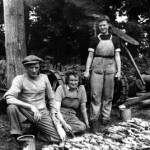 Myra, (centre) with one day's rat catch.