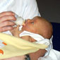 Brigid's grandson Paul Mahon holding his baby son Cailean, (Brigid's great grandson) who was born at 10:21 PM on Thursday 21st Feb 2008 just 1 hour and 39 minutes before her 90th birthday. What a great birthday present for her!