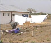 Local villager Kaddy Badjie hanging out the washing