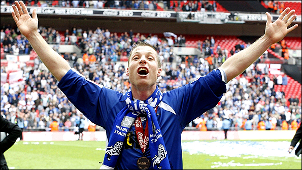 Neil Harris celebrates winning promotion