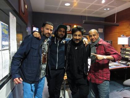 Bobby with the boys from Outlandish