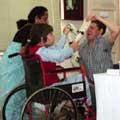 Jamie with a student at the Institute of Cerebral Palsy