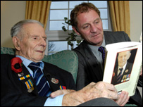 Harry Patch show's Andrew Motion his book.