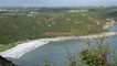 Views down over Pwl Du bay.
