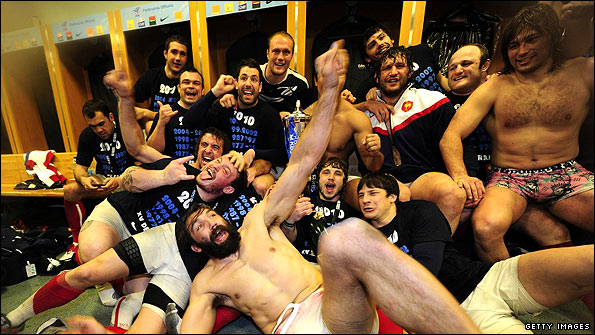 The victorious French squad celebrate their first Grand Slam for six years in their dressing room at the Stade de France.jpg