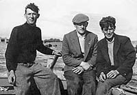 (from right to left) Jimmy Rickard of Geal Linn, Bill Quinn and an unknown islander who spoke no English