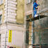 More and more of central Nizhny- Novgorod is being renovated - here a man decorates part of the University.