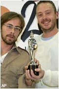 Basement Jaxx proudly show off their award