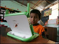 Child with green laptop
