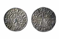 Silver penny of Cnut (Canute). Minted in Bath, England, AD 1016-35 depicting a Viking wearing a helmet without horns.