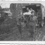 Lads unloading ambulance