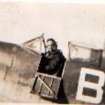 A Pilot sat in the cockpit of a spitfire RAF training school Carberry Canada