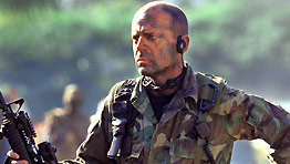 Despite copious camouflage, Bruce Willis still couldn't hide from Antoine Fuqua on the Tears Of The Sun set