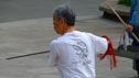 A man practising with a sword.