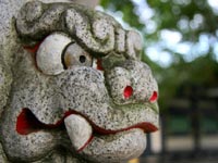 Temple tiger statue, with eyes and mouth painted to make him look ferocious © iStockphoto/Sigi Goode