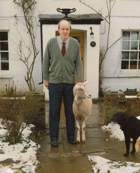 Roald Dahl, with his pet goat Alma, outside his home Gipsy House © RDNL, courtesy of The Roald Dahl Museum and Story Centre