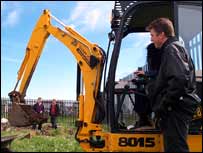 Gail using the mini JCB