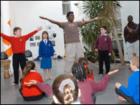Children try Nigerian dancing