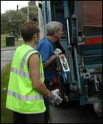 Bin men emptying a bin