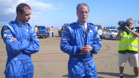 Joe Wales and father Don explain to the crowd why the record attempt failed.