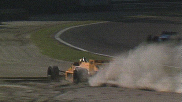 Ayrton Senna loses the lead of the 1987 Italian Grand Prix by sliding off into the gravel at Parabolica
