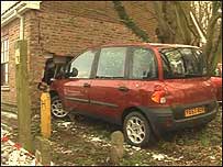 Car in wall