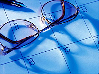 A diary with a pair of glasses