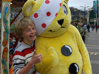 Thumbs Up from Pudsey and a young friend