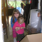 Fiona's daughter and two grand-children come to help with the clean-up operation