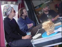 Raw Talent team enjoy breakfast on the campsite