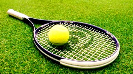 Tennis racquet and ball