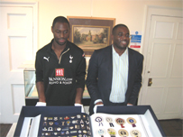 Tottenham Hotspurs Captain, Ledley King and David Lammy MP looking at Spurs Opus
