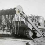 One of our Churchill "Flail" tanks modified to clear a path through mine fields. The chains flew round and banged down on the mines before the tank went over them!