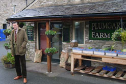 John Geldard outside Plumgarths Farm Shop