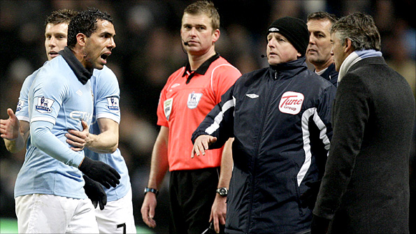 Carlos Tevez rows with City boss Roberto Mancini after being substituted against Bolton