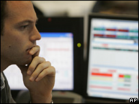Trader watching screens at London Stock Exchange