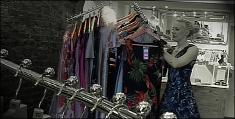 Katie prepares her shop for customers.