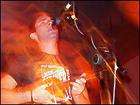 Tom, vocalist and violinist in Story One