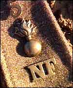 A Northumberland Fusilier's lapel badges