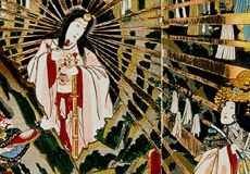 Amaterasu, depicted as a beautiful Japanese woman with rays of light emanating from her, peeps out of the cave as the other kami are cavorting