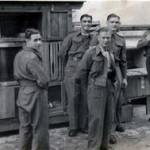 Rabbit breeding is our hobby. Note our big pet buck (Hanz) in the arms of comrade. Taken just after making selection for soup.