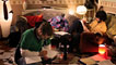 James Kristian (Tom) and Gareth Aldon (Steve) writing essays in a scene from the comedy.